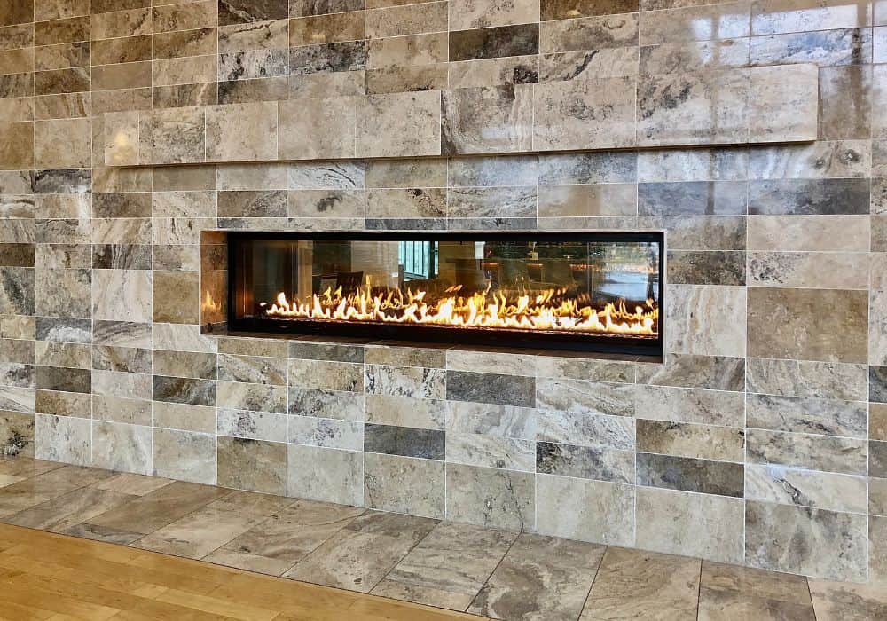 How do you maintain a gas fireplace